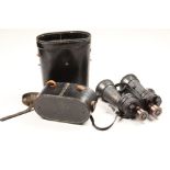 A cased pair of World War II German Leitz U – Boat binoculars, stamped 7 x 50 Beh 457572, the case
