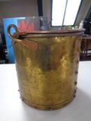 A late 19th century brass Arts and Crafts bucket