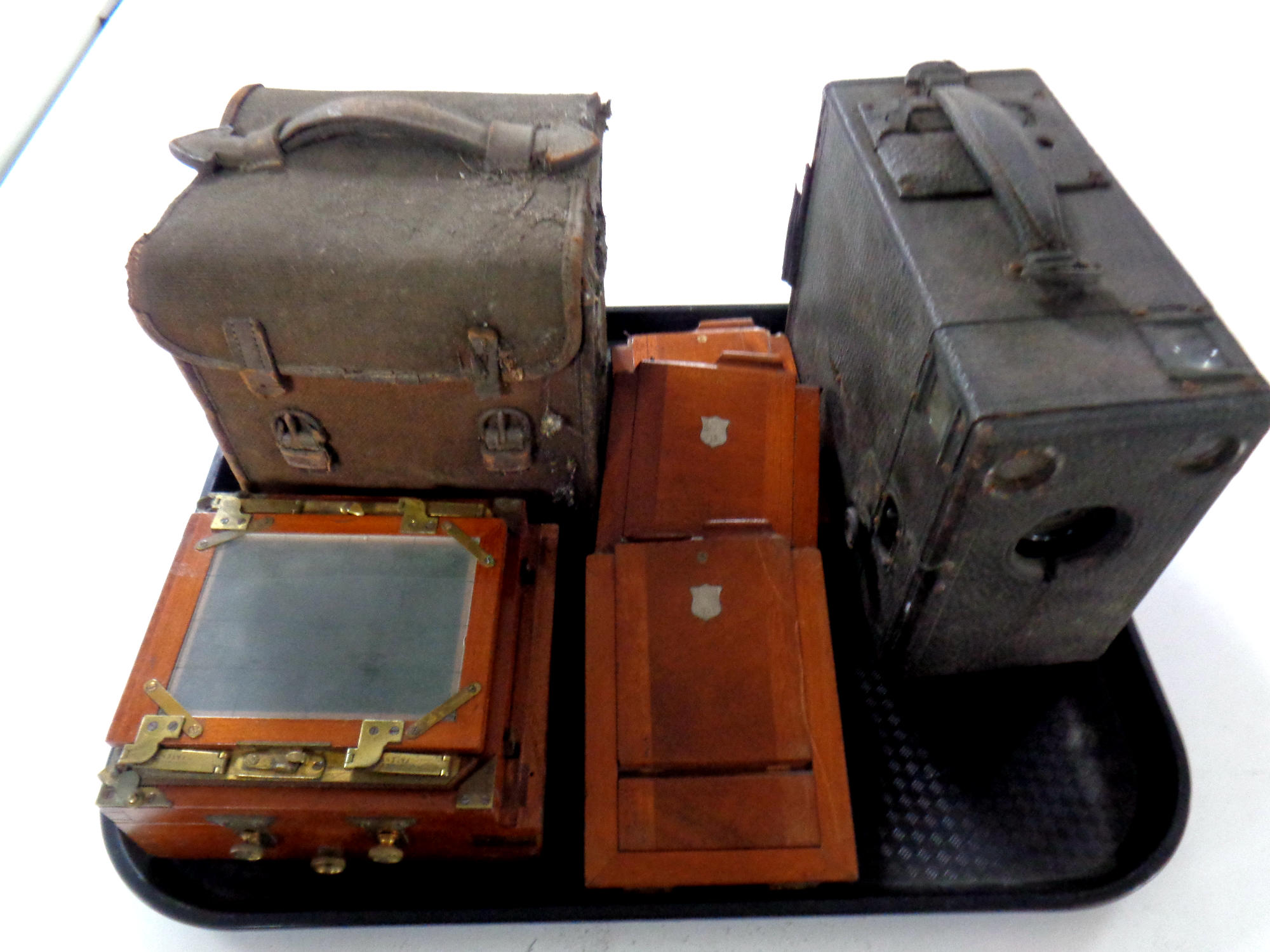 A 19th century mahogany and brass plate camera with carry case together with a further vintage