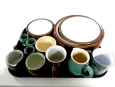 A tray of twenty two pieces of Denby tea and dinner ware