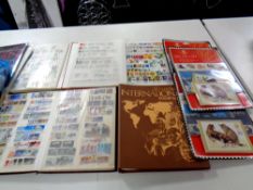 A box containing a large quantity of 20th and 21st century stamps of the world,