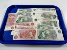 A tray of a quantity of Bank of England 10 shilling (approx 12) and £1 notes (approx 43)