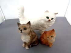 Three Beswick figures, cats, kitten seated No. 1436, Persian cat standing No.