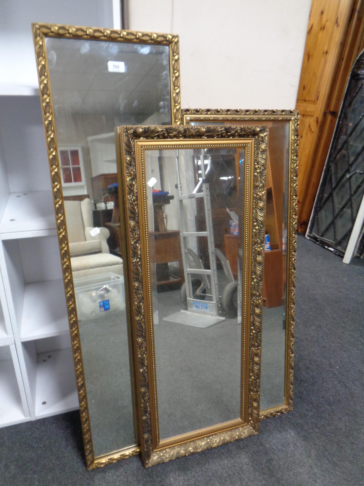 Three gilt framed bevel edged hall mirrors