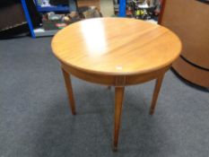 An Edwardian mahogany circular occasional table