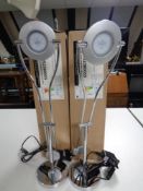 A pair of contemporary angle poise desk lamps (new,