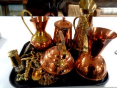 A tray of brass and copper jugs and teapots, coffee pot, brass embossed jug,