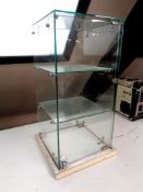 A 20th century glass counter top display cabinet