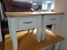 A pair of contemporary oak topped lamp tables fitted a drawer on painted bases