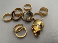 Twelve brass sample wedding rings