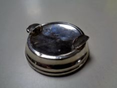 A silver ashtray