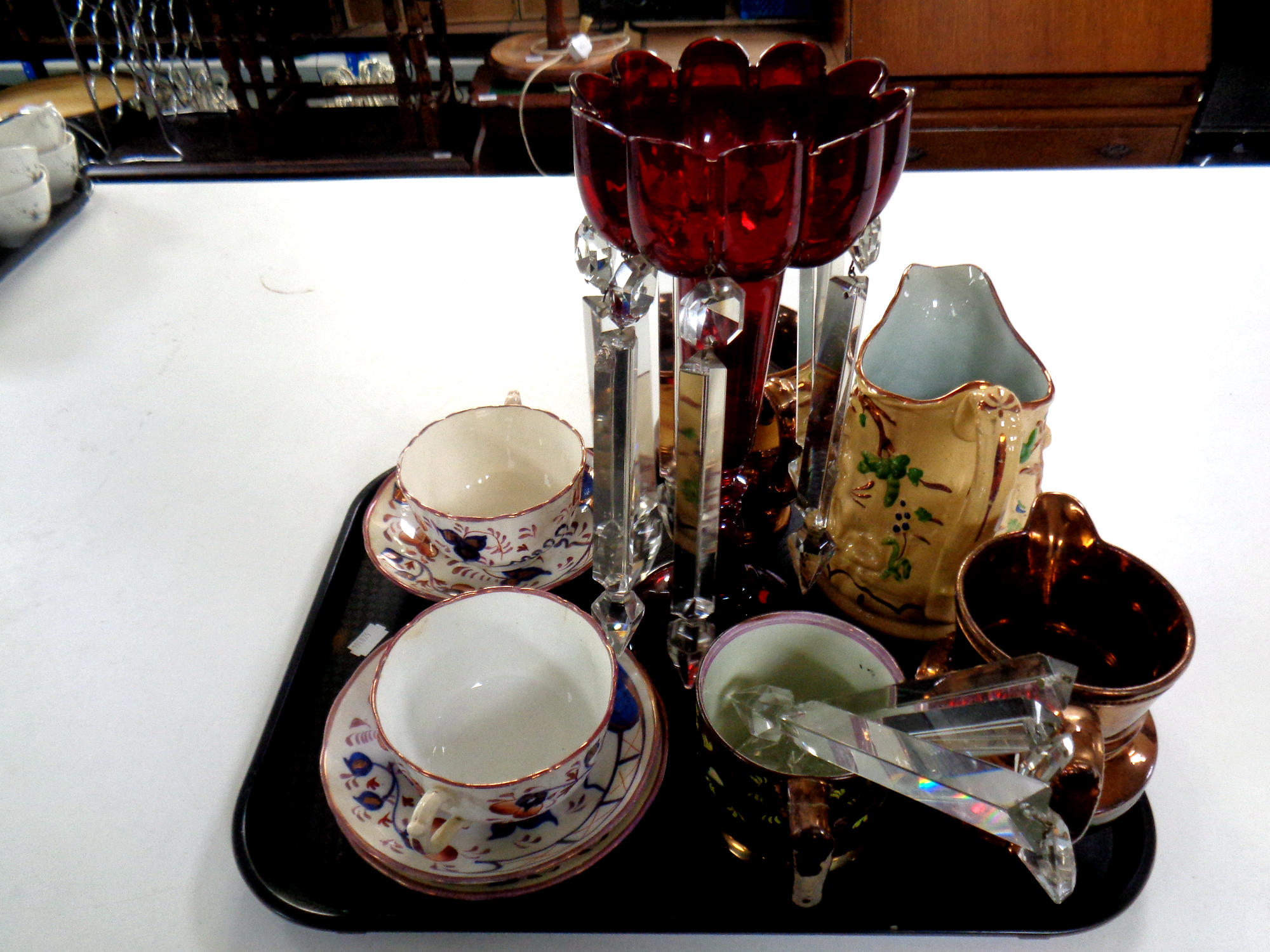 A tray of antique ceramics : copper lustre jugs, tankard, Welsh tea cups and saucers,