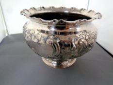 An antique silver plated embossed planter