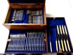 An Edwardian canteen with two lift out trays containing a silver plated cutlery service