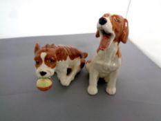 Two Beswick dog figures, Nap Time No. 2950 and Caught It No.