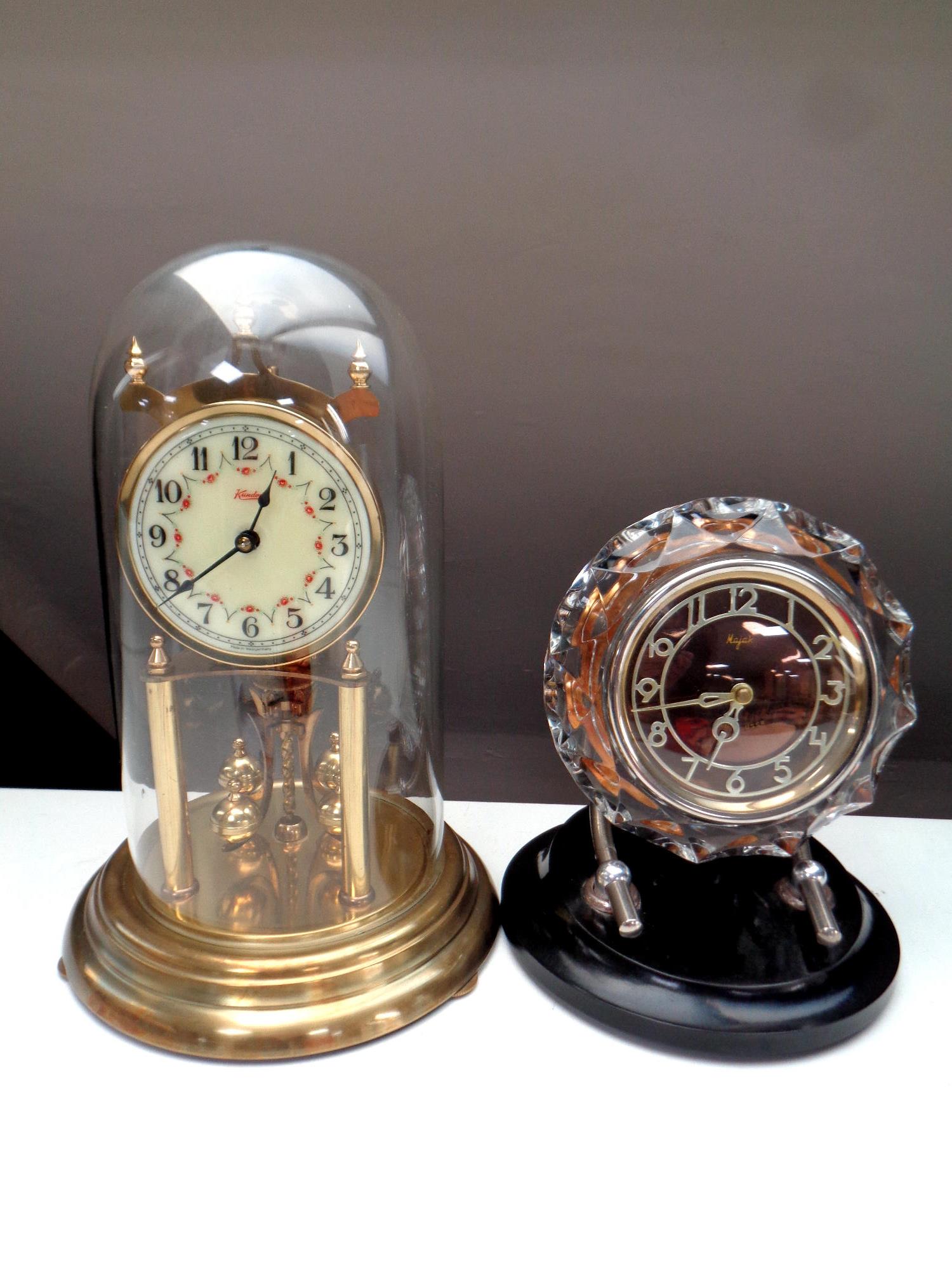 A 20th century Russian Najak Art Deco clock on Bakelite stand,