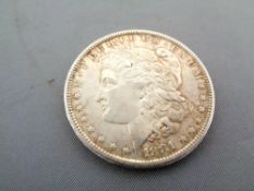 An 1881 American silver dollar