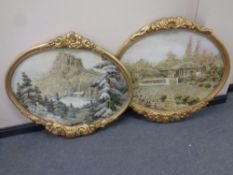 A pair of gilt framed mother of pearl collage pictures depicting Japanese landscapes (2)