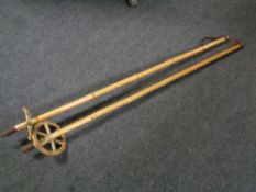 A pair of vintage bamboo and wicker ski poles