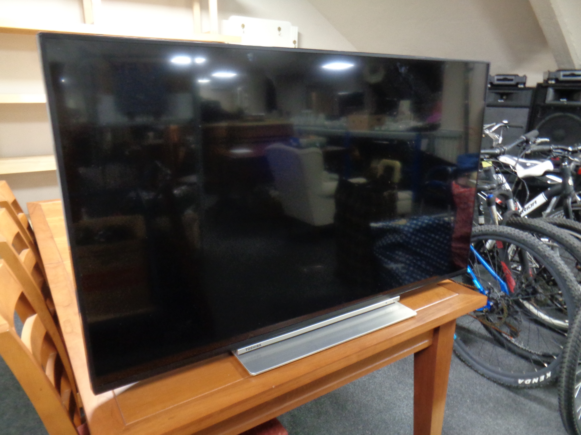 A Toshiba 43" LCD TV with remote
