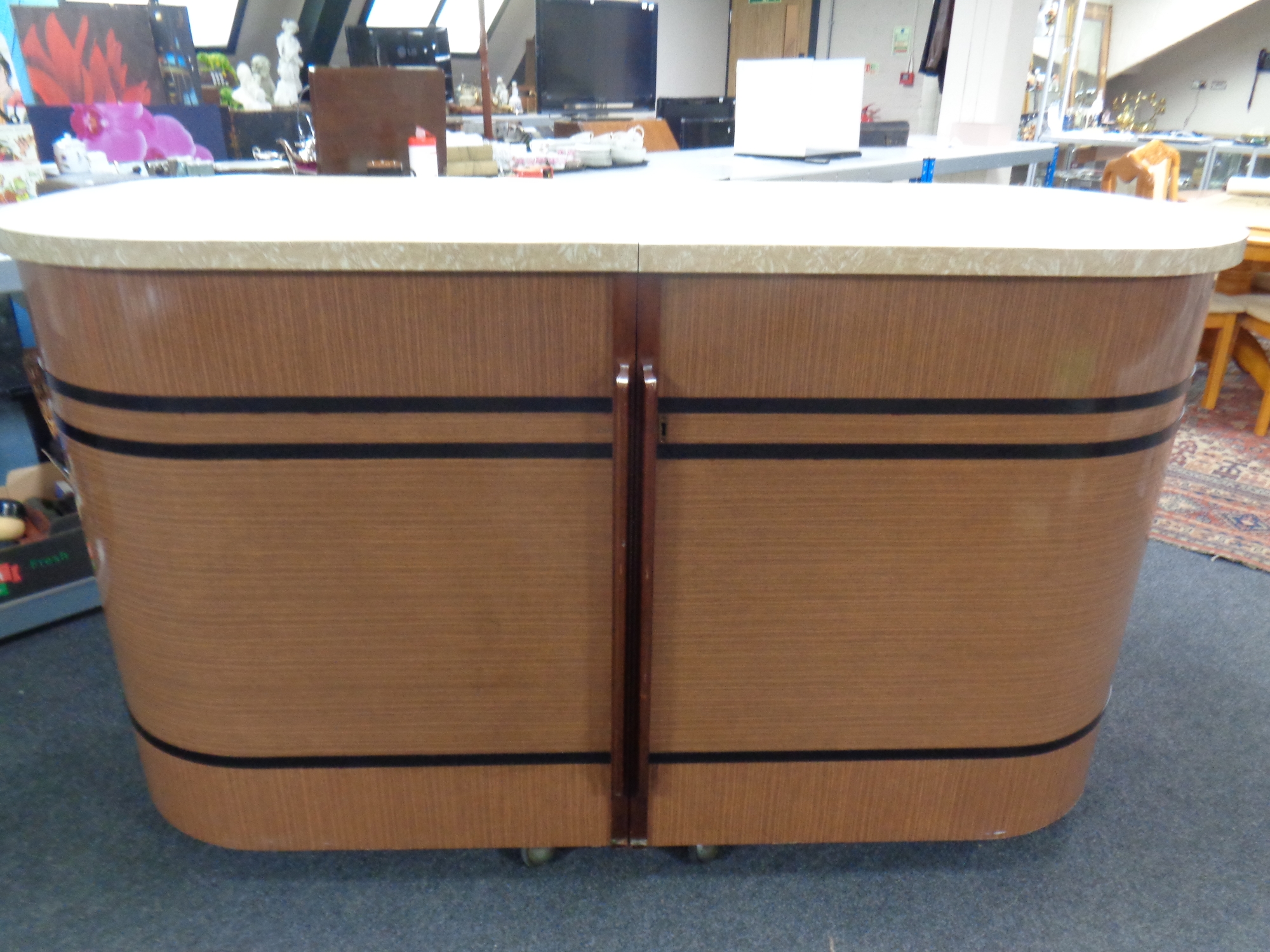 A mid 20th century Art Deco style cocktail bar, manufactured by Price Brothers of Penarth,