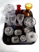 A tray containing antique and later glassware to include miniature glass bottles, decanter stoppers,
