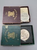 Two 1951 Festival of Britain crowns in boxes