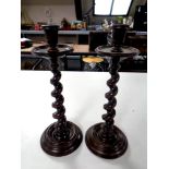 A pair of Edwardian barley twist candlesticks