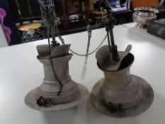 A pair of antique hanging gas lamps