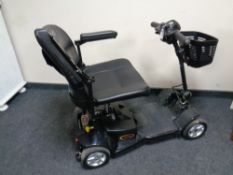 A Pride Apex light mobility cart with battery and charger