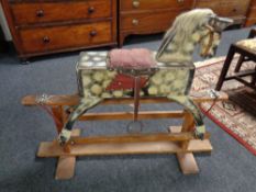 An early 20th century wooden rocking horse