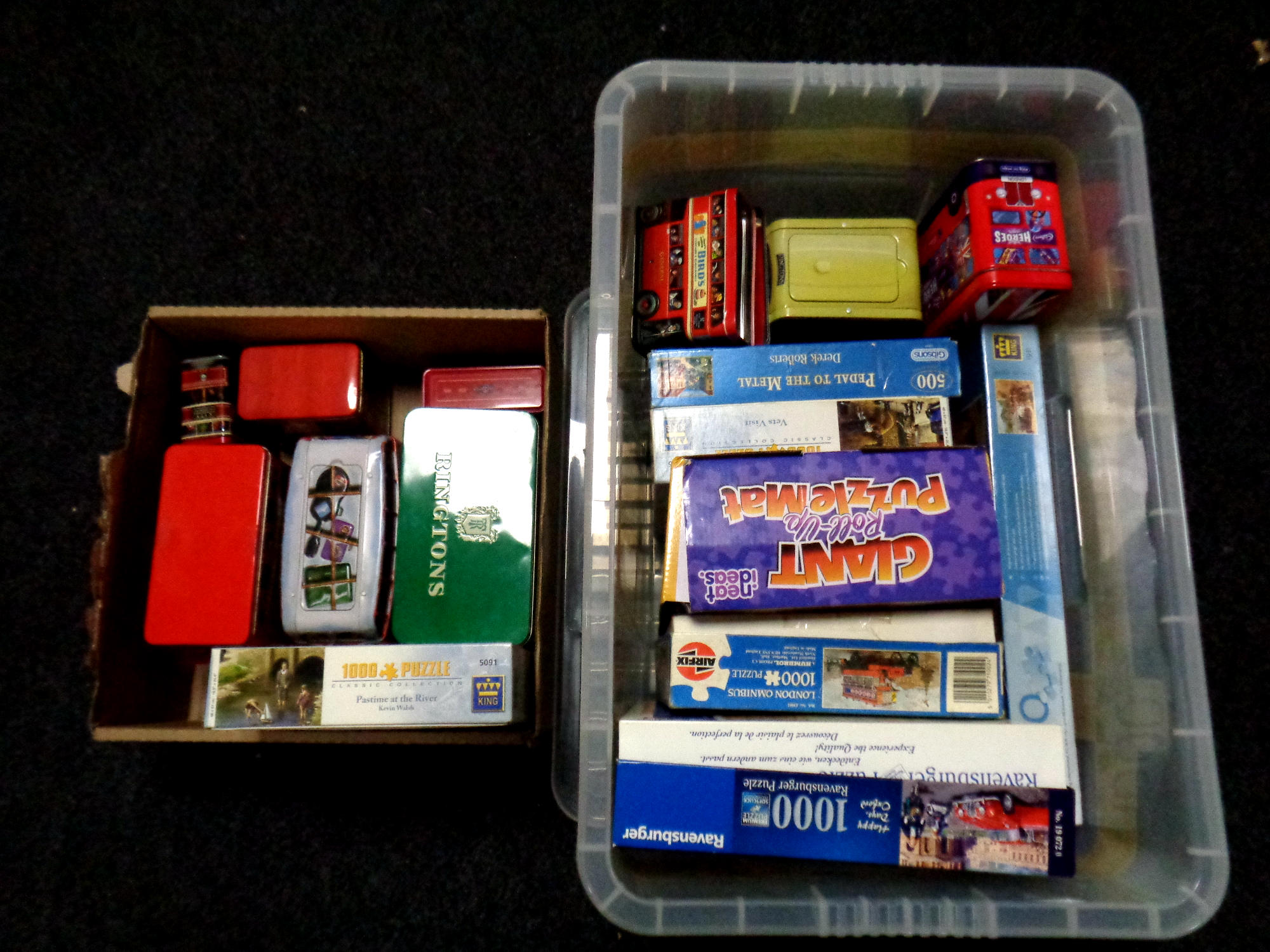A plastic storage crate with lid together with a box containing Airfix modelling kit, jigsaws,