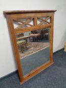A sheesham wood framed overmantel mirror