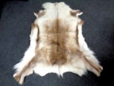 A reindeer hide rug