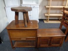 A 20th century sewing trolley together with an oak double door low cupboard and a rustic stool