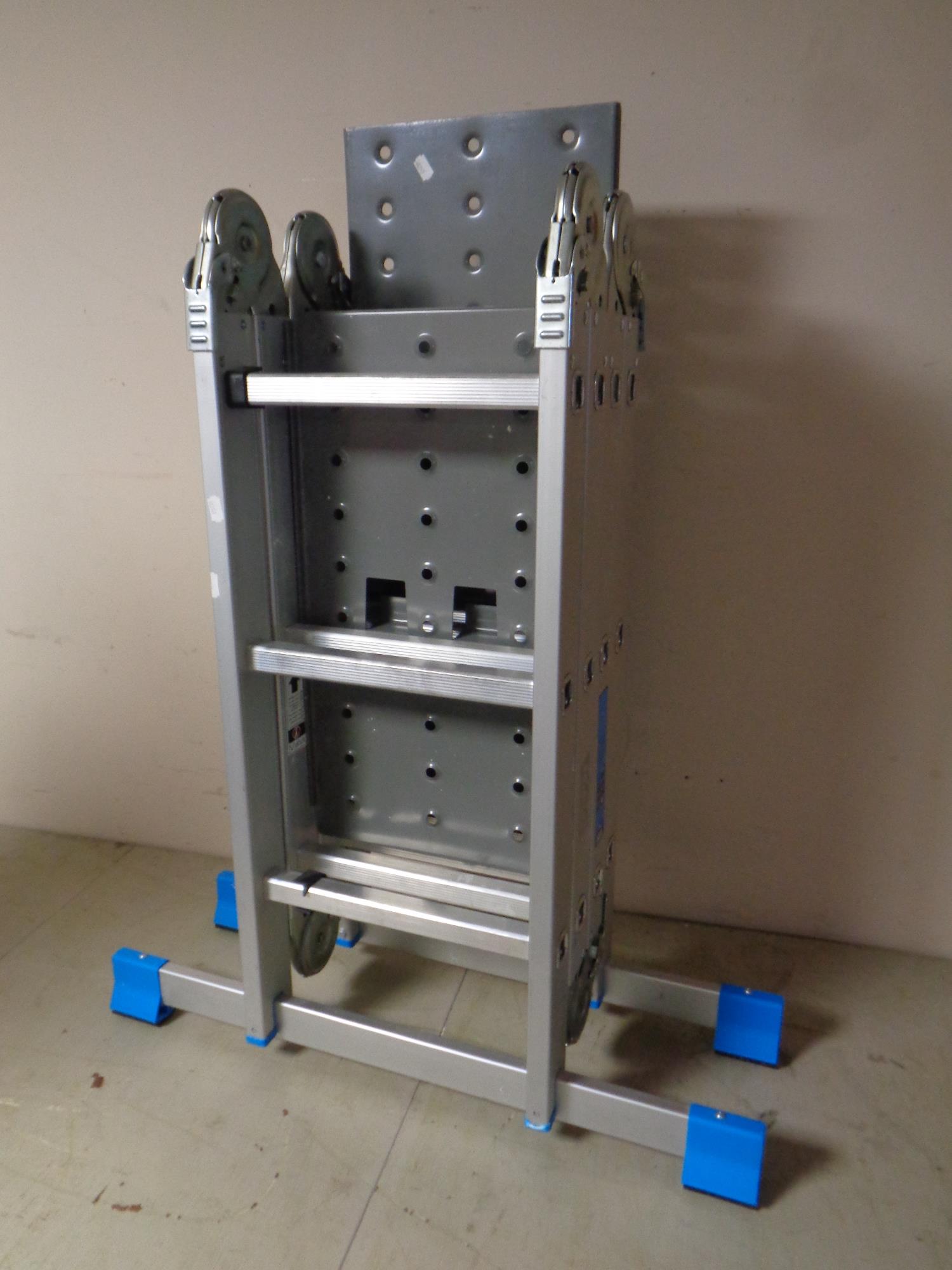 A set of MacAllister aluminum folding multi function ladder with platform