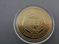 A 500 year sovereign anniversary coin, gold on silver CONDITION REPORT: 20.2G.