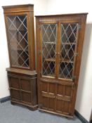 Two leaded glass door corner display cabinets