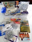 A box containing a quantity of plastic modelling kits to include Airfix Guards Band,