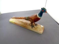 A Beswick figure, Pheasant on pottery base No.