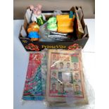 A box containing miscellaneous to include mid 20th century Rover comics, Wade Natwest money box,