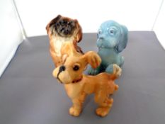 Three Beswick dog figures, Lollopy dog, seated puppy No. 454, dog with collar Scamp No.