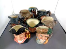 Eight small Royal Doulton character jugs to include The Poacher, The Falconer, Rip van Winkle,