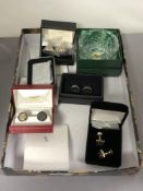 Four cased cuff link sets together with a lighter and crystal ashtray and a First Born blanket and