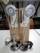A pair of contemporary angle poise desk lamps (new,