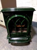A Stovax cast iron green enameled stove