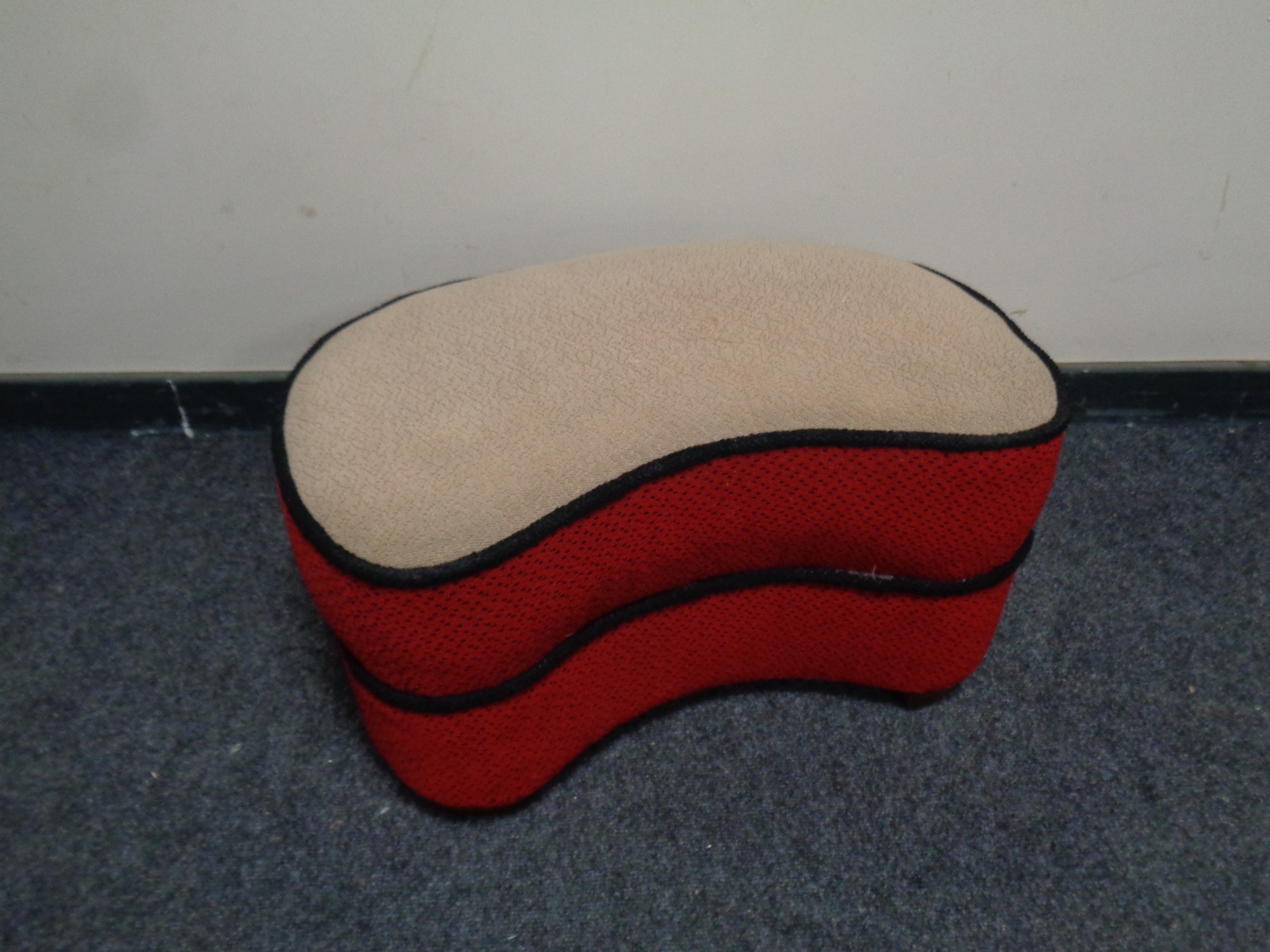 A mid 20th century kidney shaped footstool