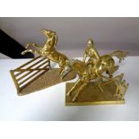 Two brass ornaments, horse and rider jumping fence,