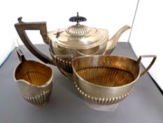 A three piece silver tea service, Birmingham 1904 CONDITION REPORT: 615g gross.