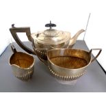 A three piece silver tea service, Birmingham 1904 CONDITION REPORT: 615g gross.